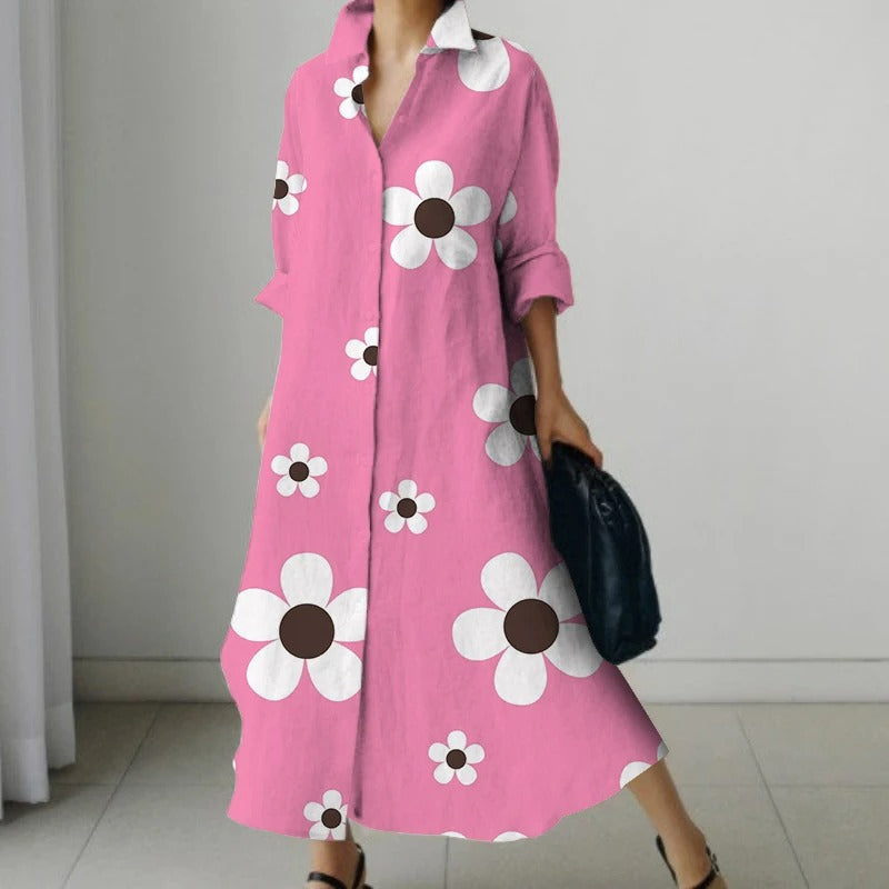 Zwarte comfortabele blouse jurk met bloemenprint en v-hals