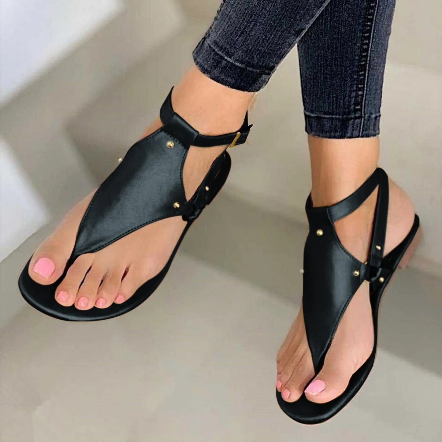 NIMA zwart bruin retro leren teensandalen
