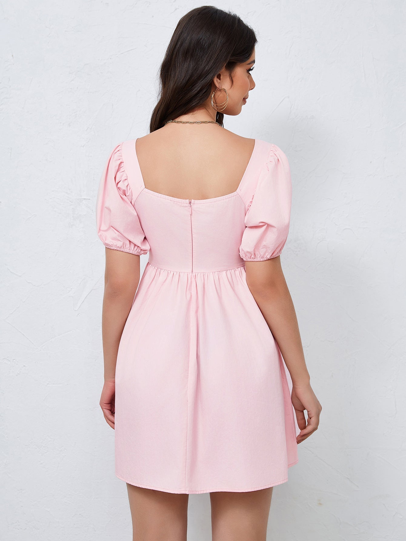 NIMA afslankende taille roze mini jurk