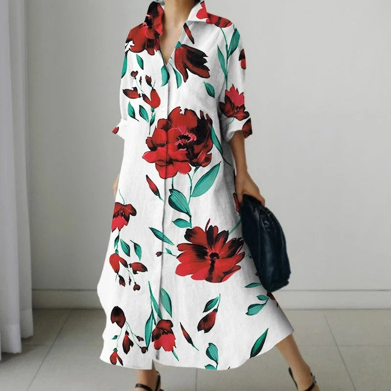 Zwarte comfortabele blouse jurk met bloemenprint en v-hals