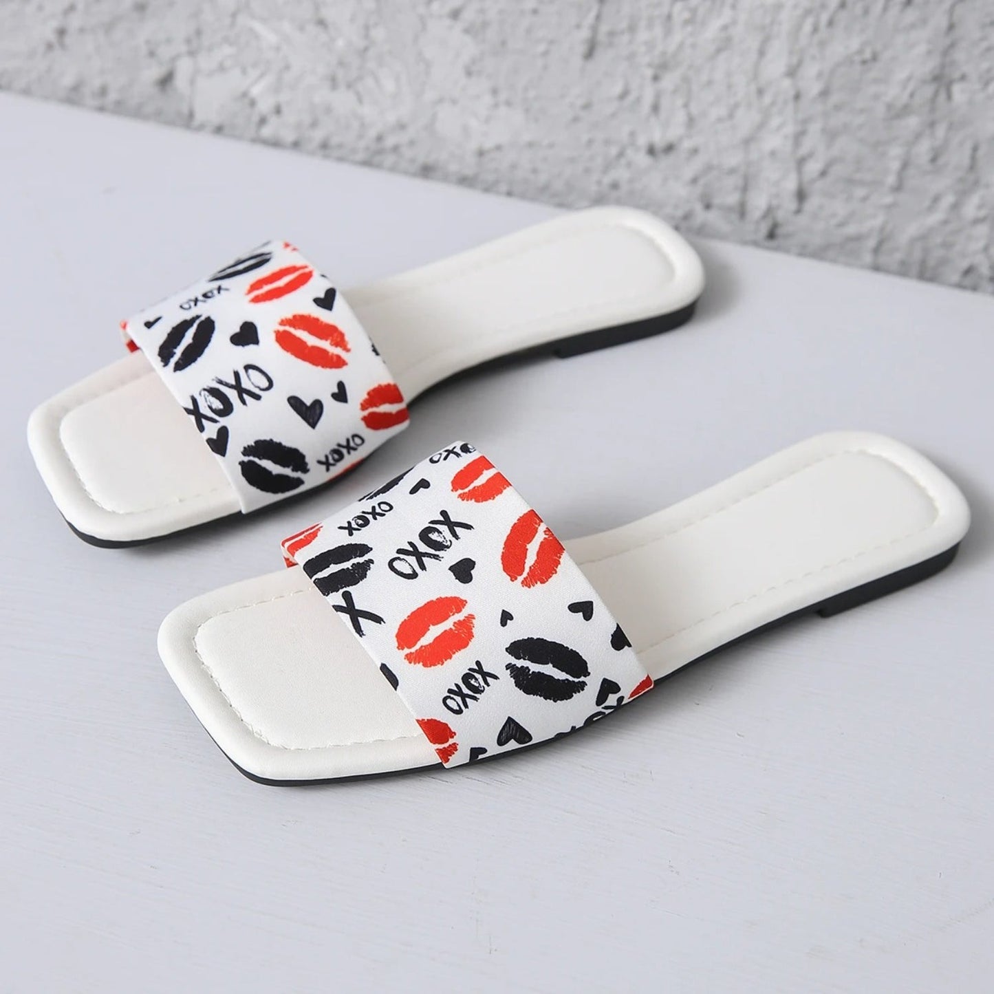 NIMA antislip comfortabele slippers met zwarte opdruk