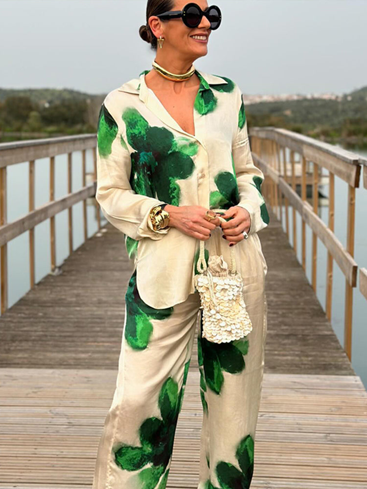 NIMA witte blouse en broek set met groene bloemenprint