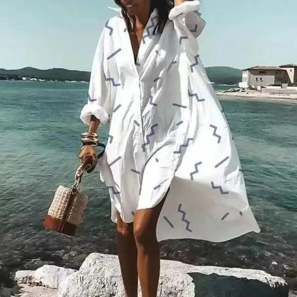 NIMA Elegante witte blouse jurk met luipaardprint