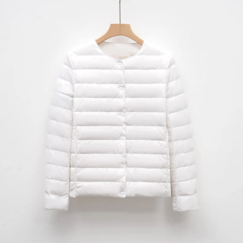 Freja – lightweight fitted down jacket with snap closure