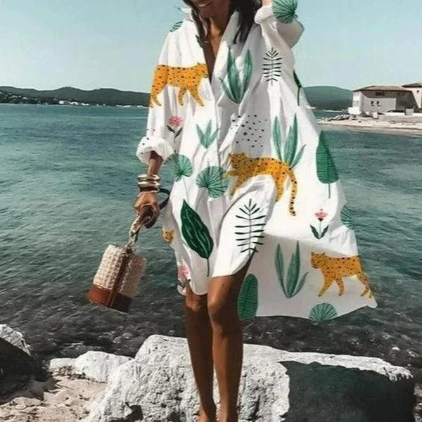 NIMA Elegante witte blouse jurk met luipaardprint