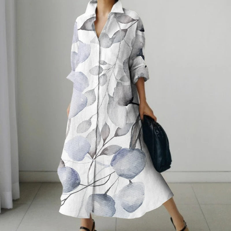 NIMA Elegante zwarte blouse jurk met bloemenprint en draaikraag