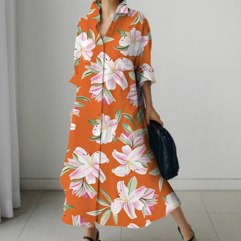 Zwarte comfortabele blouse jurk met bloemenprint en v-hals