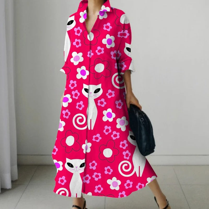 Zwarte comfortabele blouse jurk met bloemenprint en v-hals