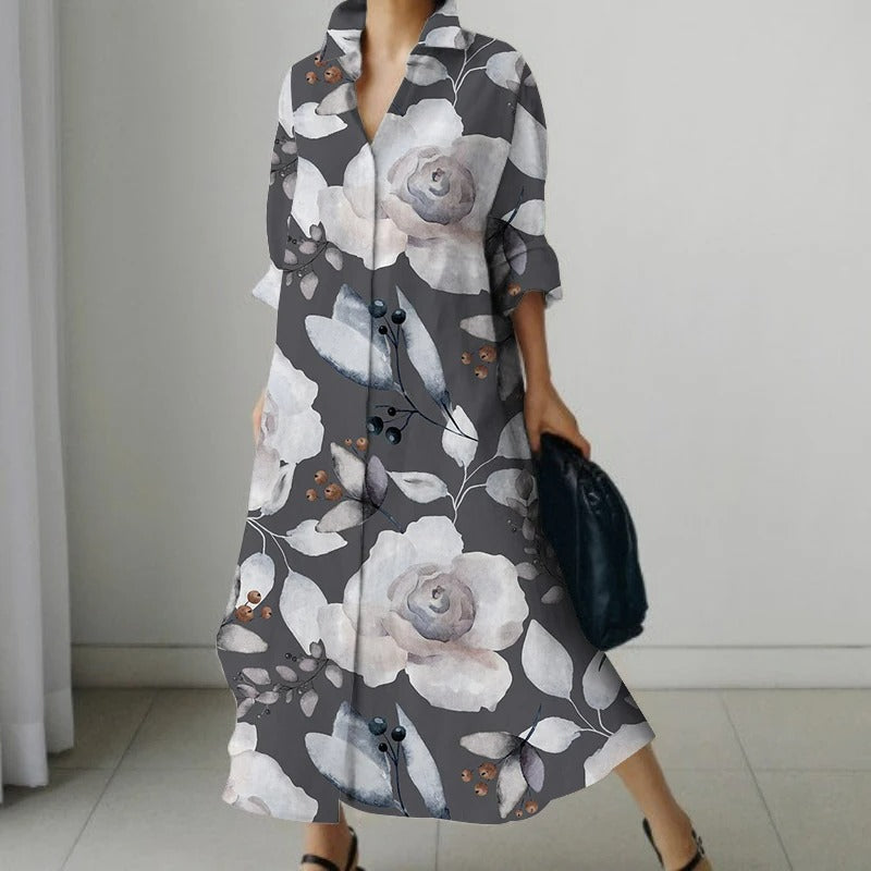 NIMA Elegante zwarte blouse jurk met bloemenprint en draaikraag