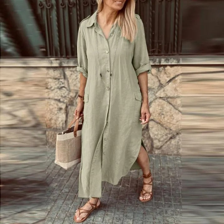 Zwarte eenvoudige blouse jurk met omslagkraag en knoopjes