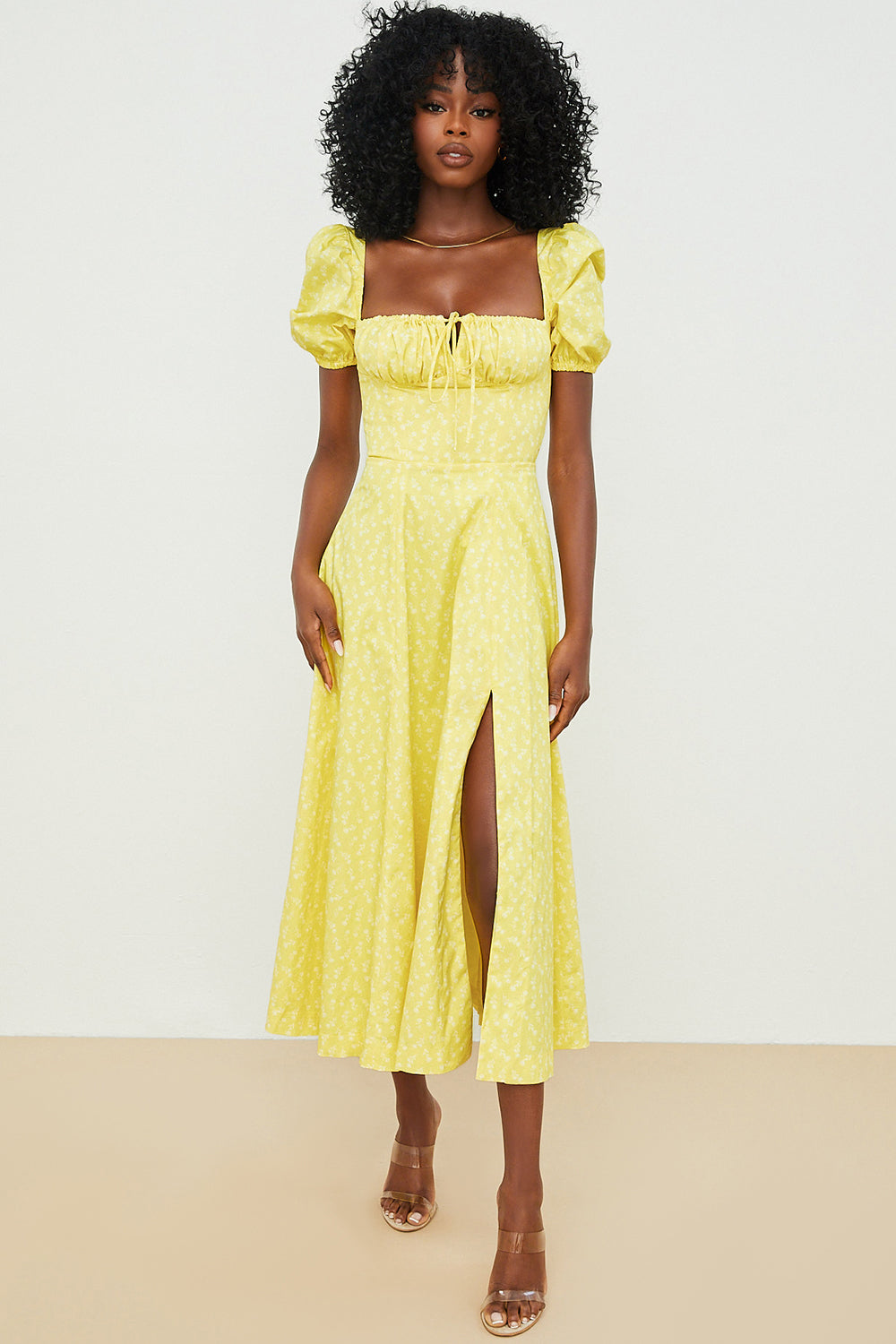 NIMA Midi zonnejurk met bloemenpofmouwen
