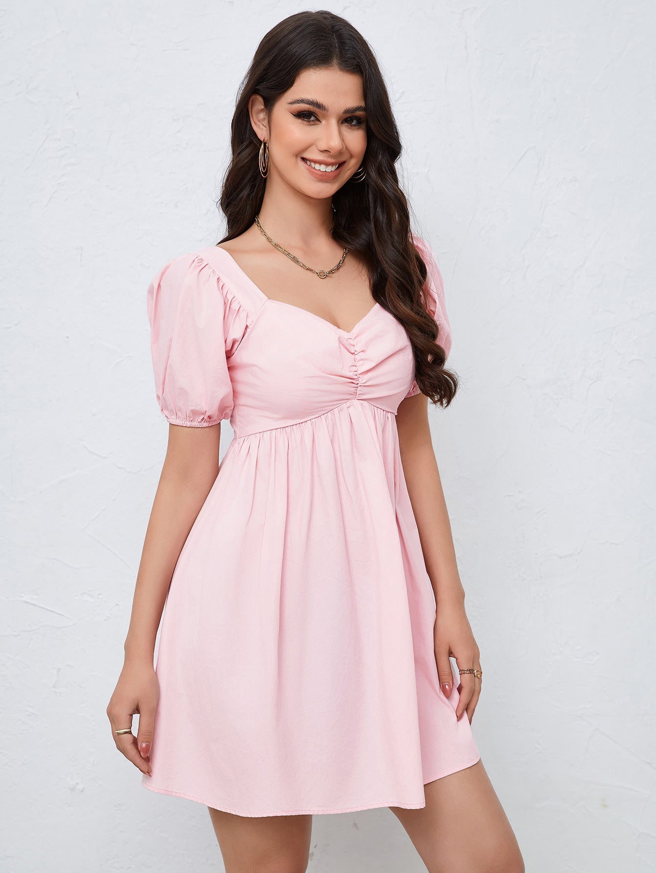 NIMA afslankende taille roze mini jurk