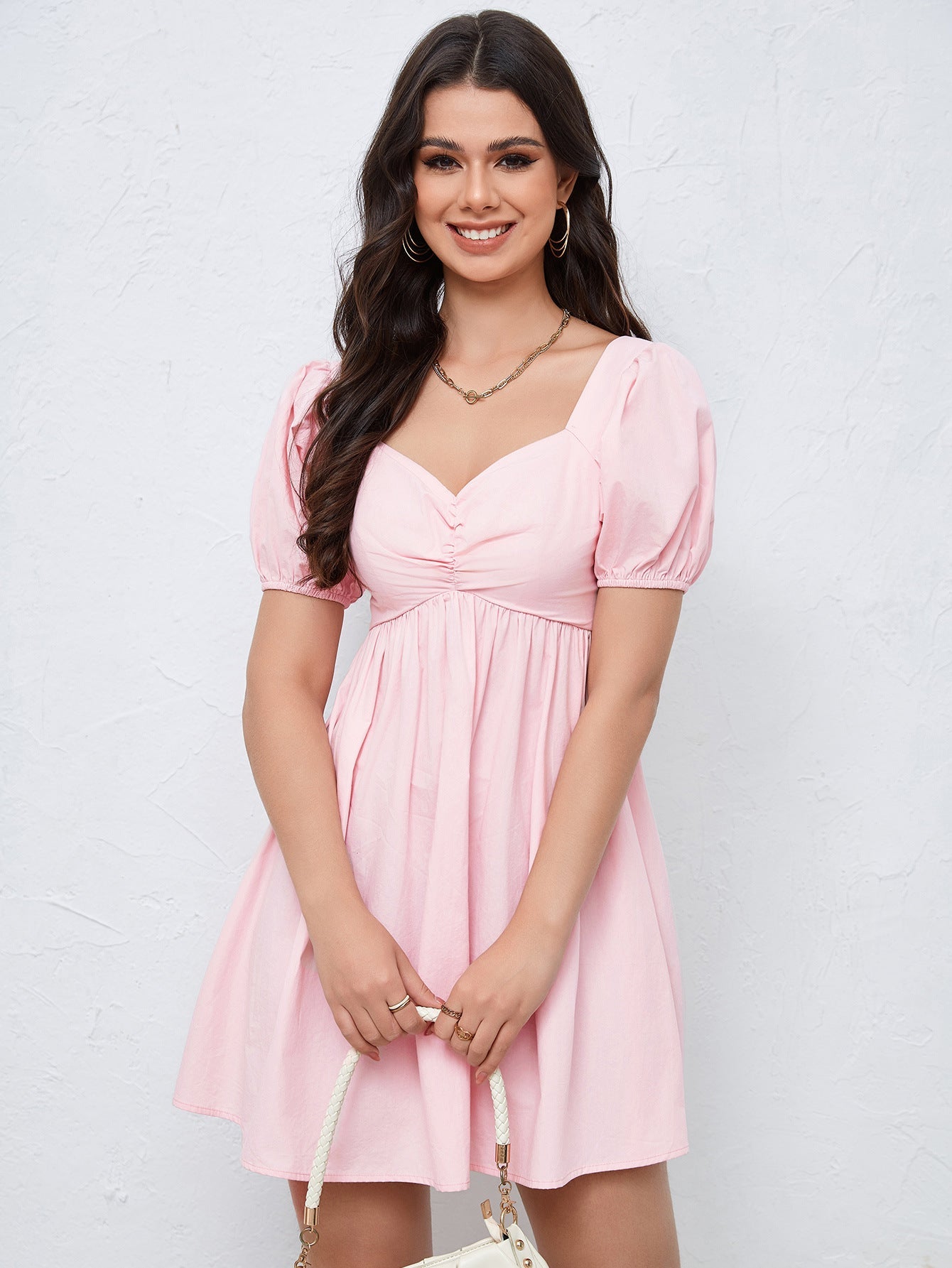 NIMA afslankende taille roze mini jurk