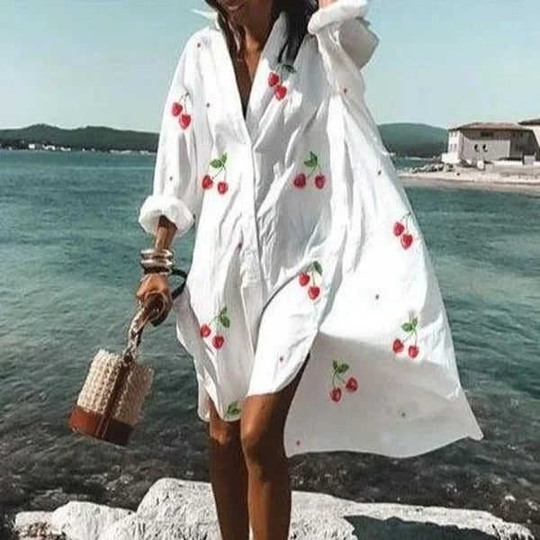 NIMA Elegante witte blouse jurk met luipaardprint