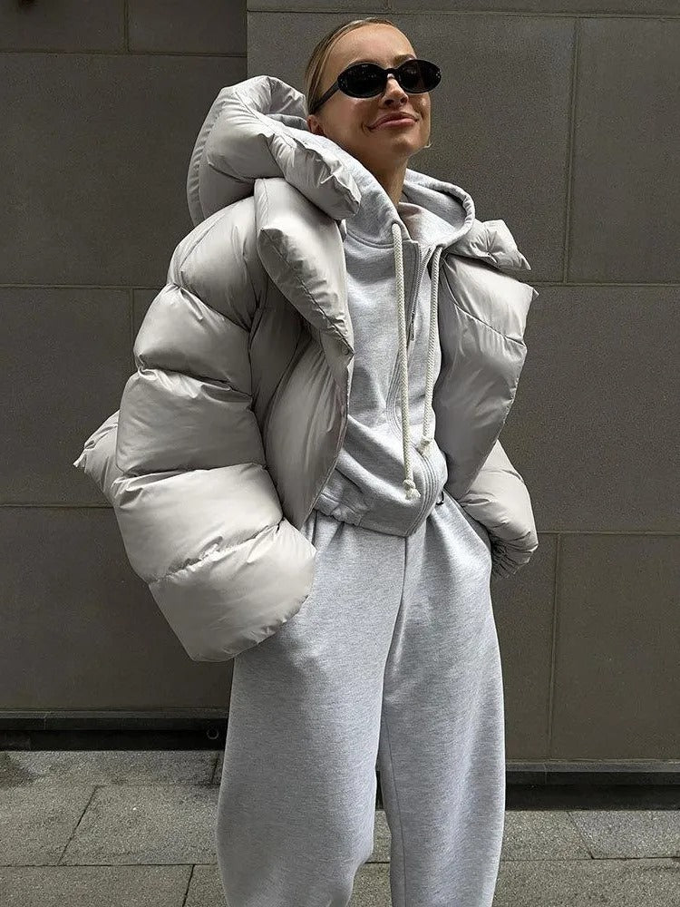 Padded women's jacket with hood - warm down jacket in a short model