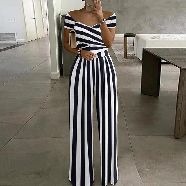 NIMA Maxi jumpsuit print off-shoulder v-hals
