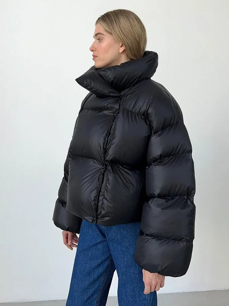Padded women's jacket with hood - warm down jacket in a short model