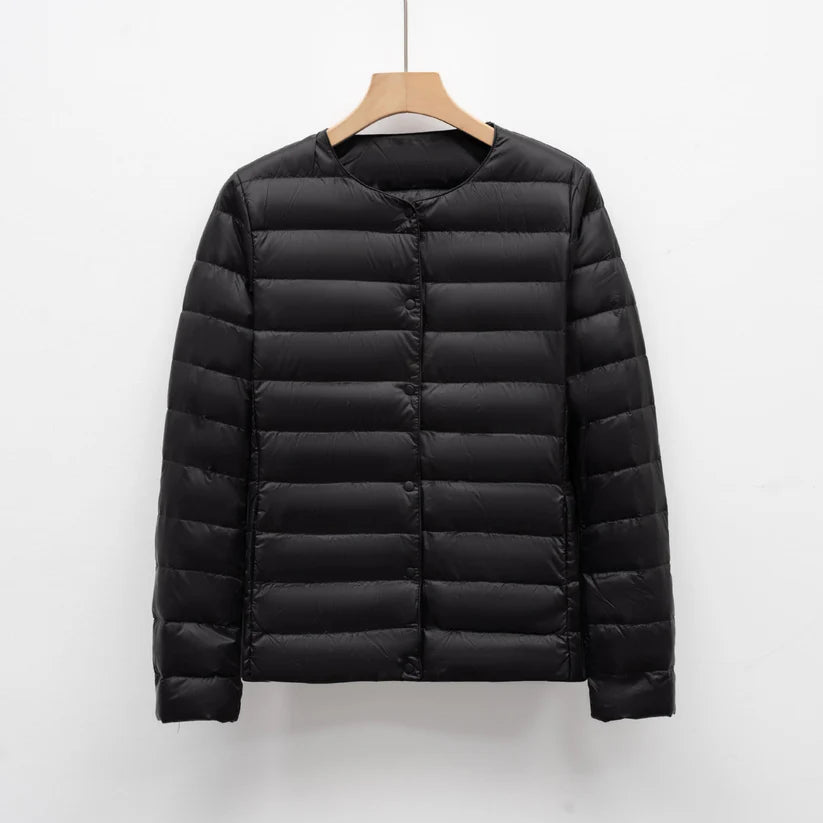 Freja – lightweight fitted down jacket with snap closure