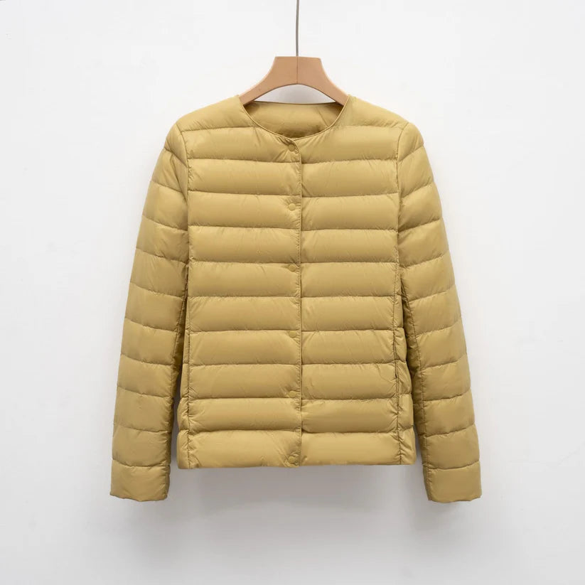 Freja – lightweight fitted down jacket with snap closure