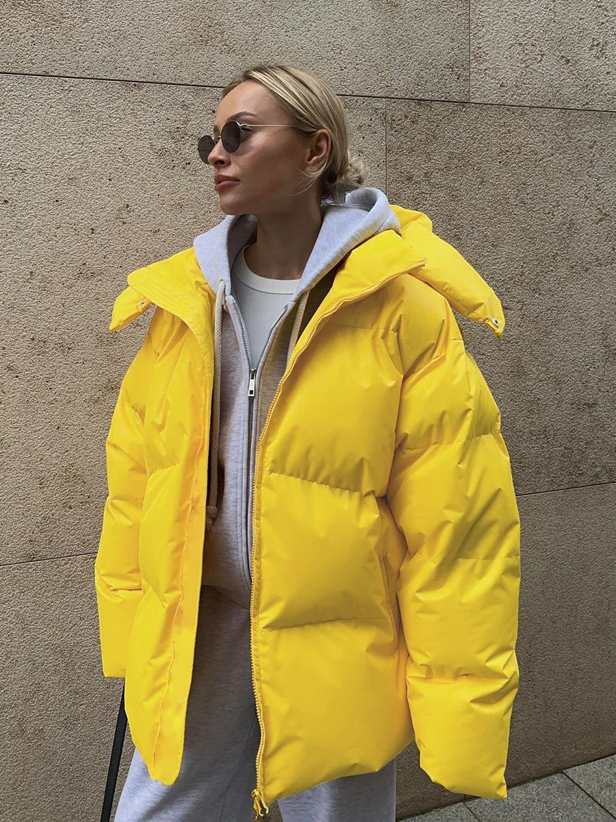 Padded women's jacket with hood - warm down jacket in a short model
