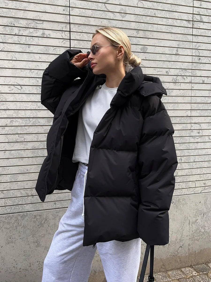 Padded women's jacket with hood - warm down jacket in a short model