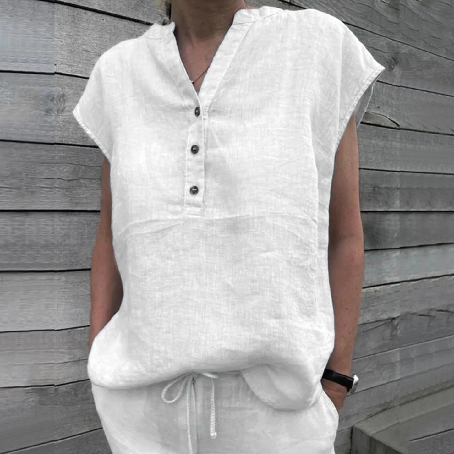 NIMA witte staande kraag knoop linnen dames blouse