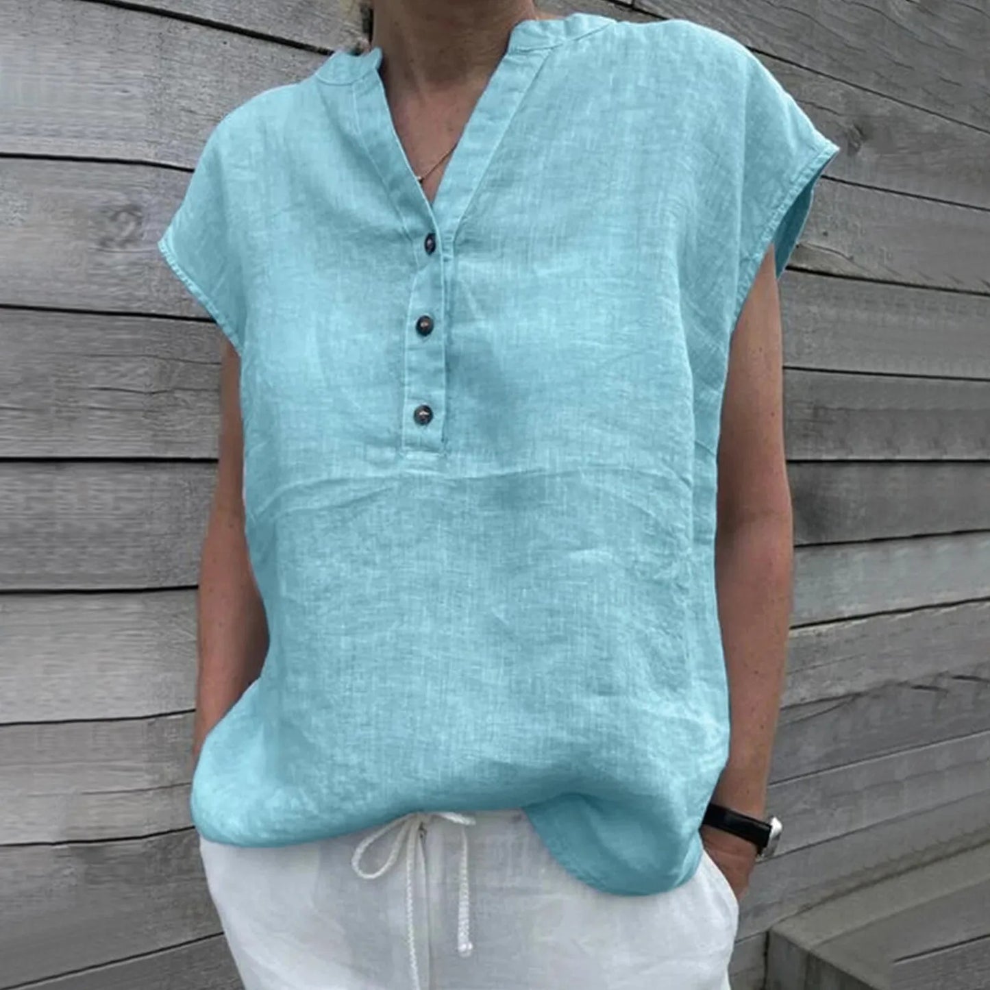NIMA witte staande kraag knoop linnen dames blouse