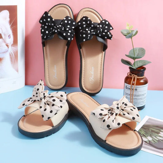 NIMA witte stippenprint lichtgewicht slippers